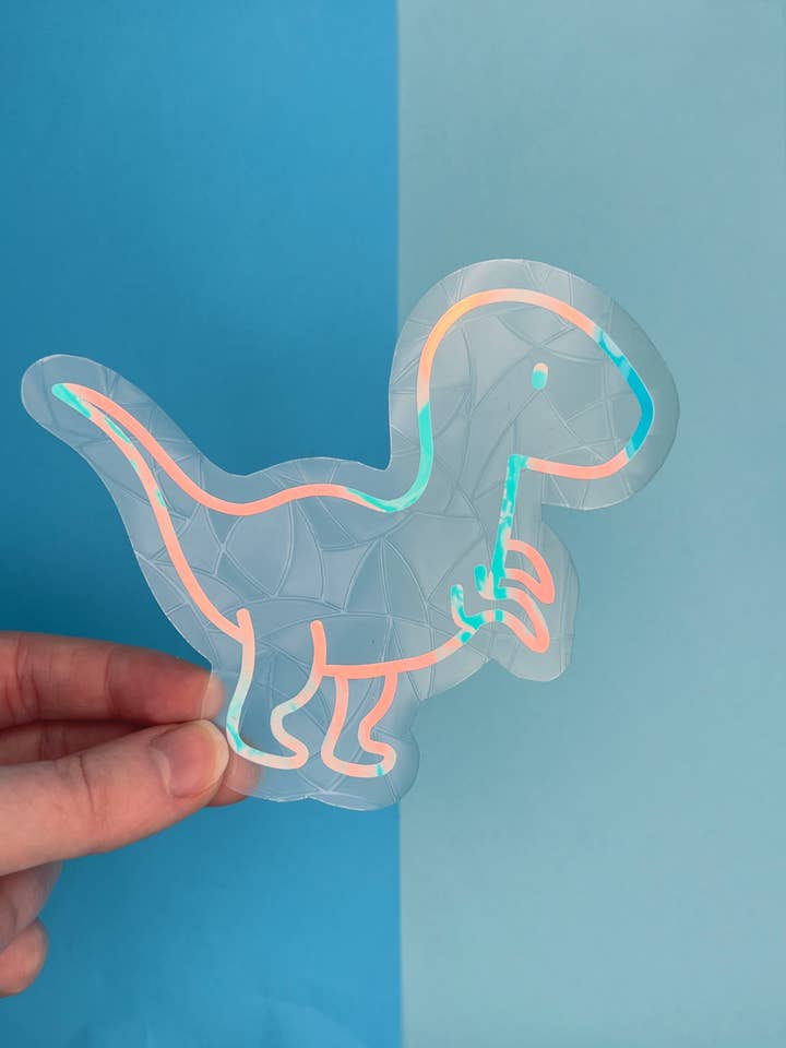 Spud the Velociraptor Suncatcher for wholesale by Poppodopolis