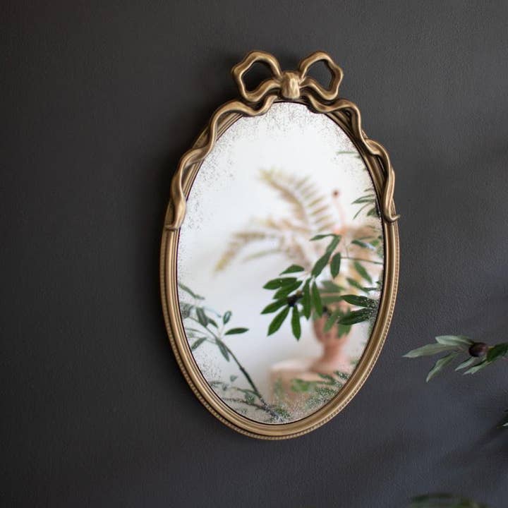 FRAMED ANTIQUE GLASS MIRROR WITH BOW  and other Purchase Wholesale small mirrors. Free Returns & Net 60 Terms on Faire trending on Faire.