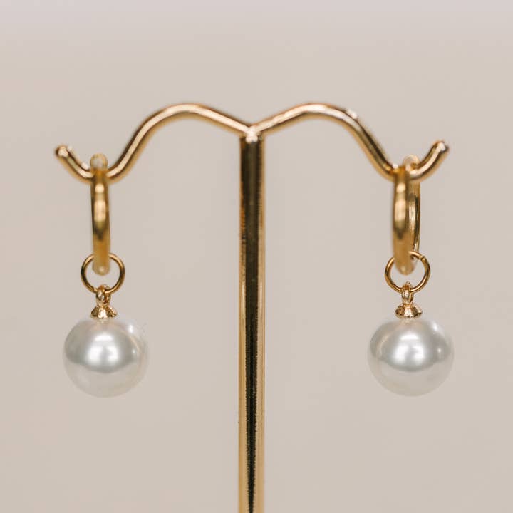 Pearl Huggie Earrings for wholesale by Eby Ruth