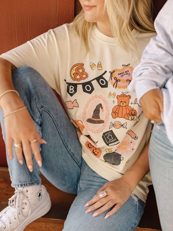 Boo Halloween Collage Graphic Tee and other Purchase Wholesale halloween graphic tee. Free Returns & Net 60 Terms on Faire trending on Faire.