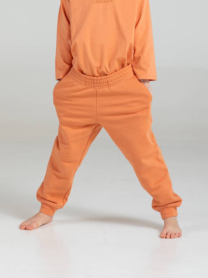 Hope Sweatpants Kids - Orange für den Großhandel von Rock on and Namaste