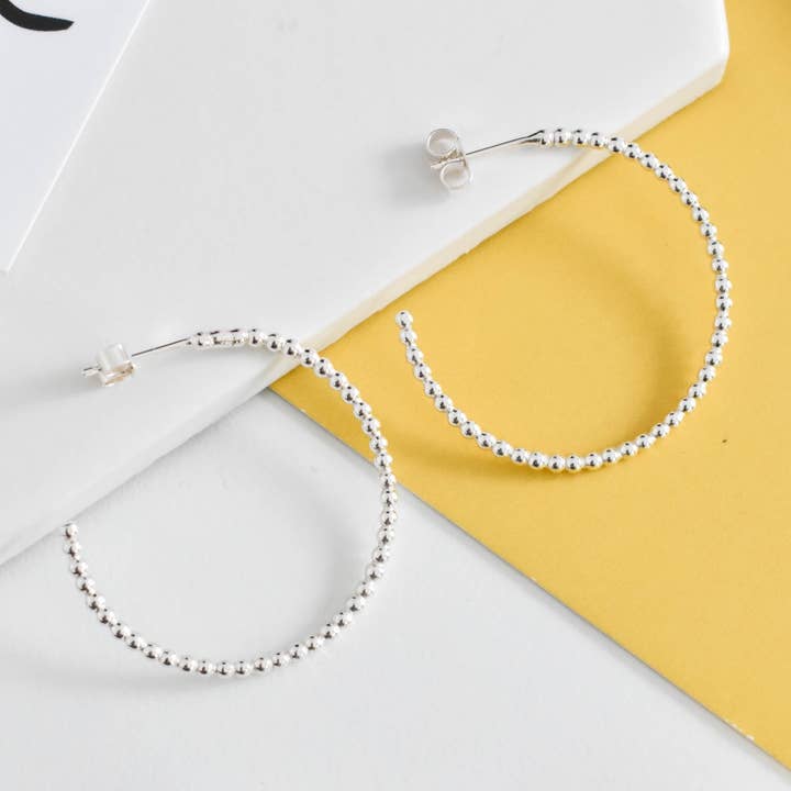 Large Dotty Silver Hoop Earrings for wholesale by Claire Lowe Jewellery