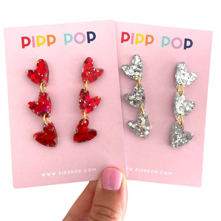 Glitter Heart Dangles - 8 Colours Available and other Purchase Wholesale heart shaped sparklers. Free Returns & Net 60 Terms on Faire trending on Faire.