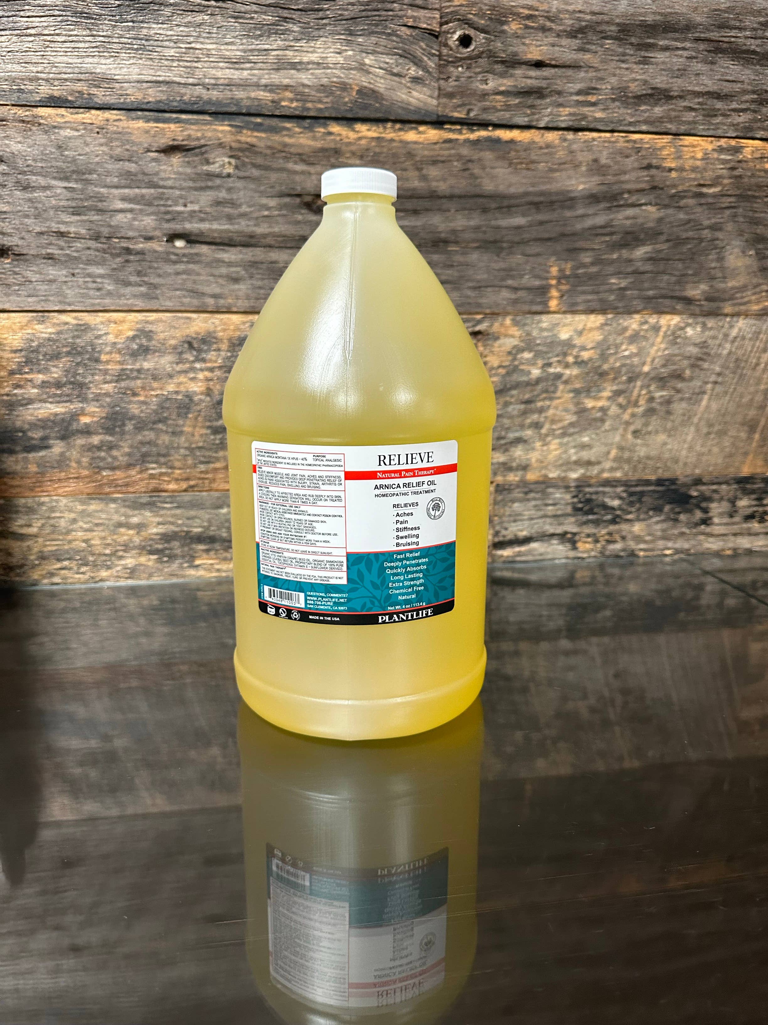 Plantlife – Großhandel Ätherisches Öl – Arnika-Entlastungsöl in Großmengen1