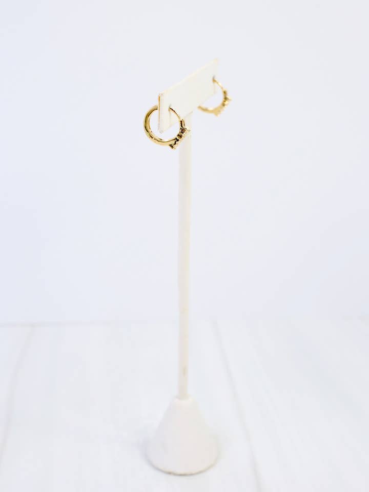 Las Cruces CZ Cross Huggie Earring WR Gold for wholesale by Caroline Hill