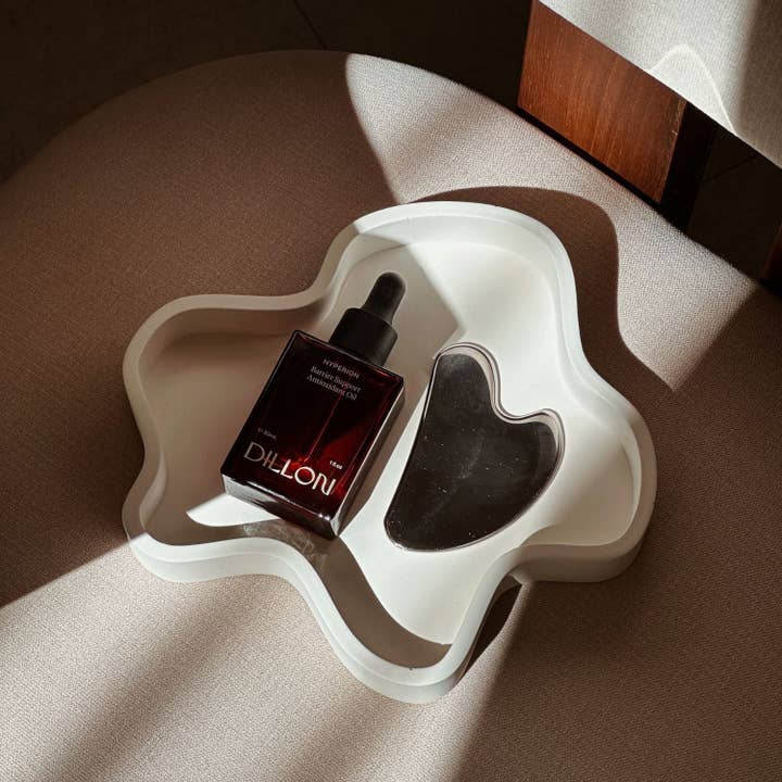 Månsten Luelle Vågig Bricka för wholesale på Faire