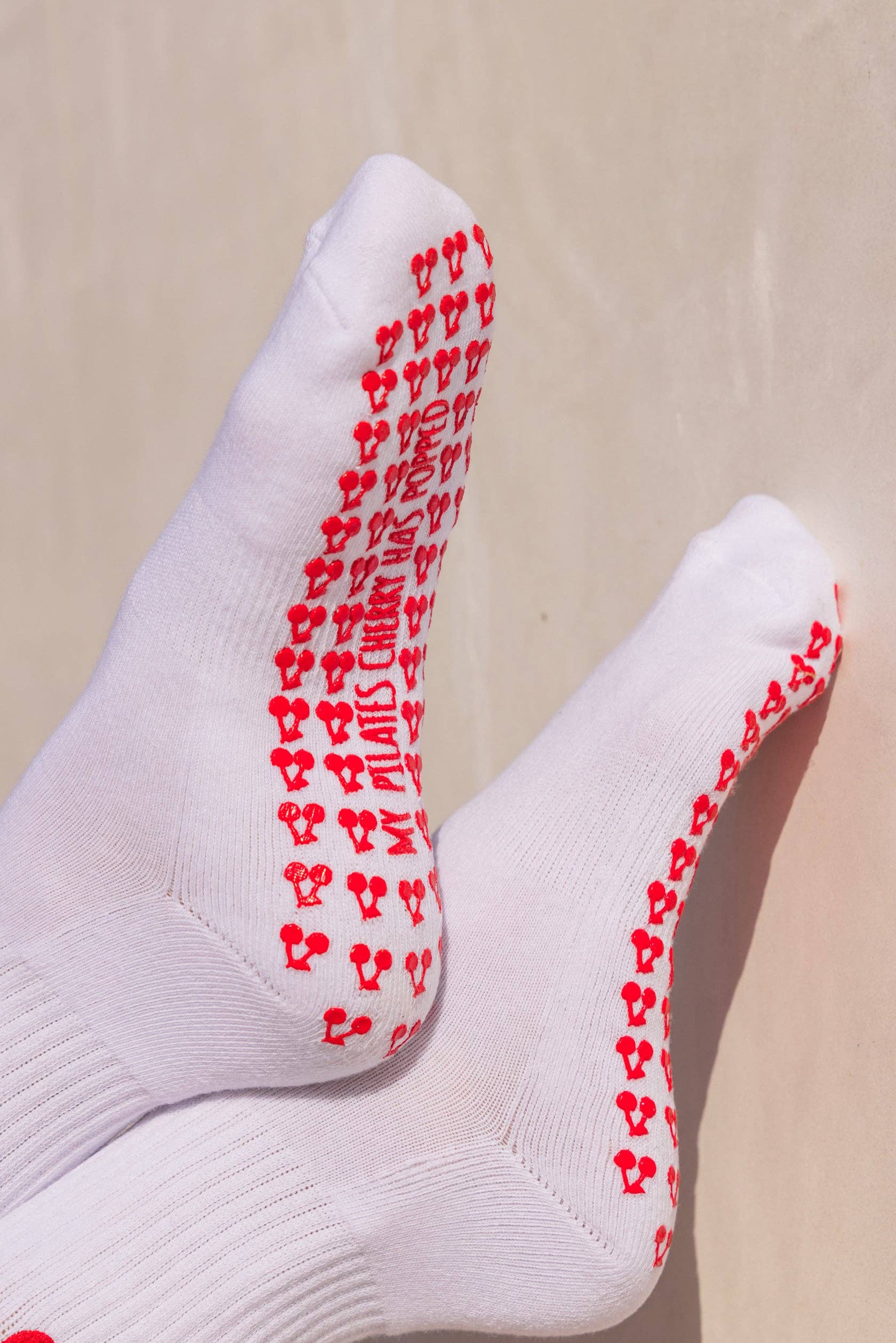 White Popped My Cherry Pilates Grip Socks for wholesale on Faire5