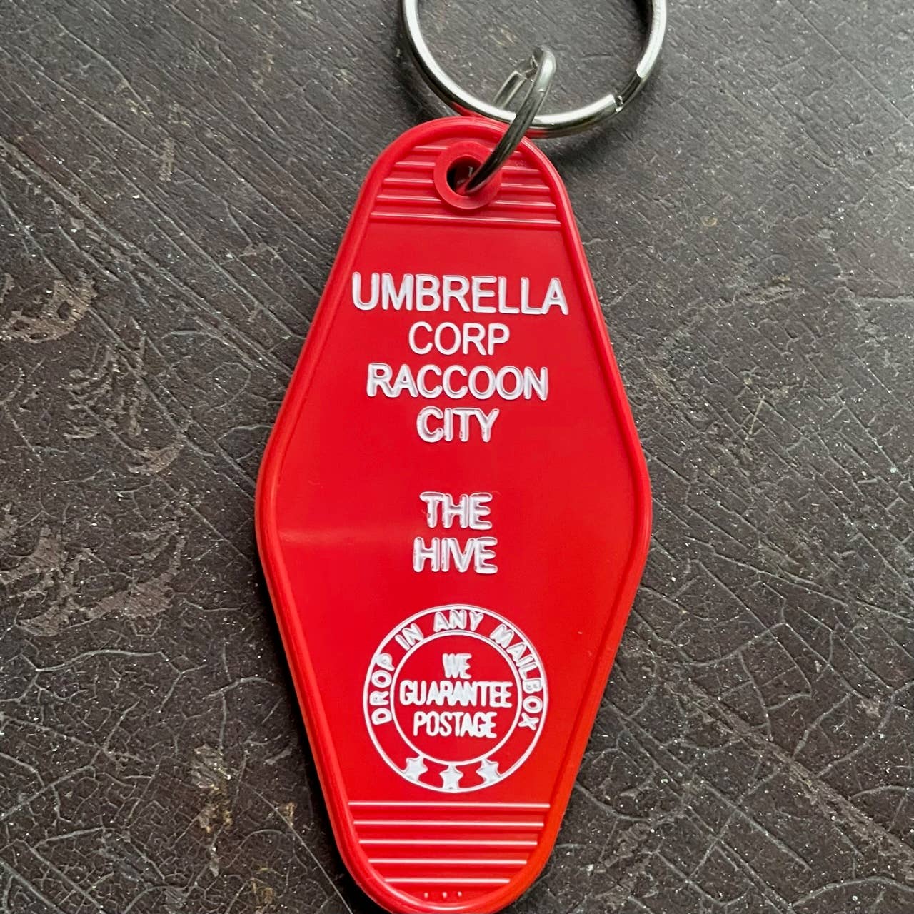 The 3 Sisters Design Co. - Wholesale Keychain - Unisex - Motel Key Fob - Umbrella Corp (Resident Evil)0