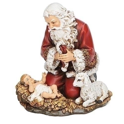 Roman - Vente Décoration de Noël - Père Noël à genoux tenant un chapeau avec bébé et agneau figurine0