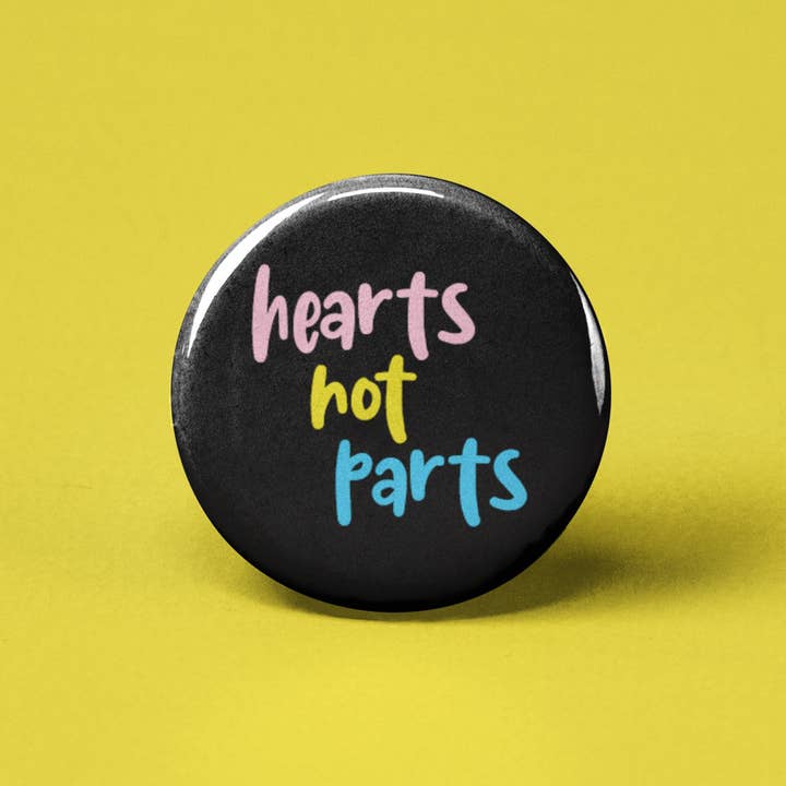 Hearts Not Parts Pinback Button for wholesale by The Pin Pal Club