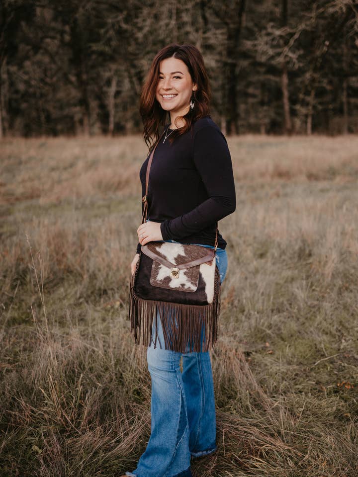 Envelope style cross body cowhide bag for wholesale by FRINGE & LUXE