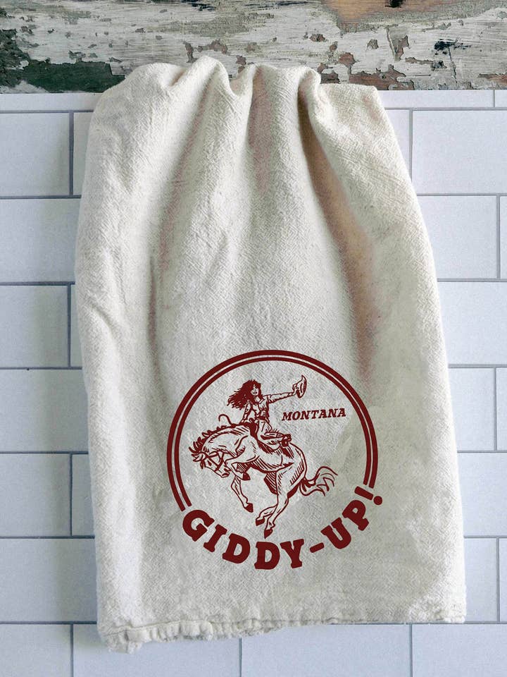 Giddy Up Gal Montana Tea Towel for wholesale by Intrigue Ink