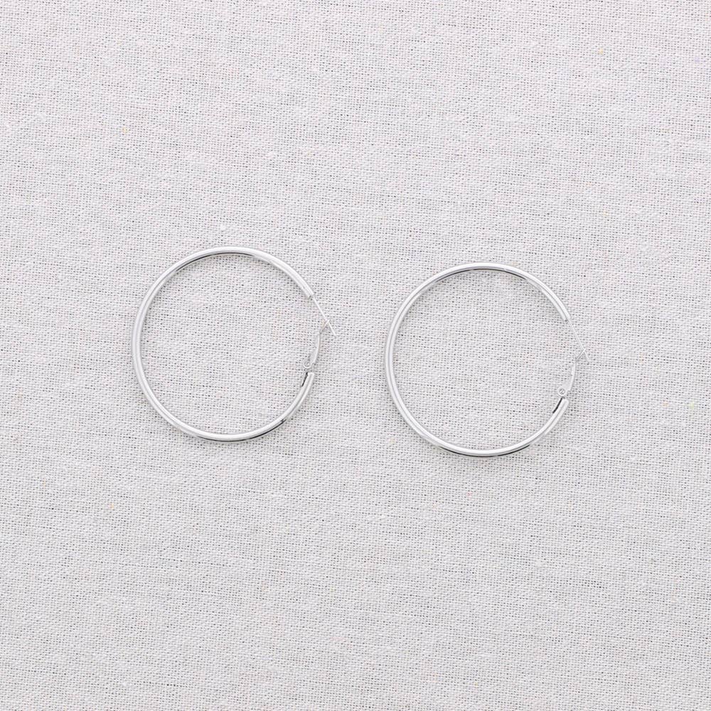 Sonata - Vendita all'ingrosso Orecchini a cerchio - Orecchini a cerchio in acciaio da 5 cm2