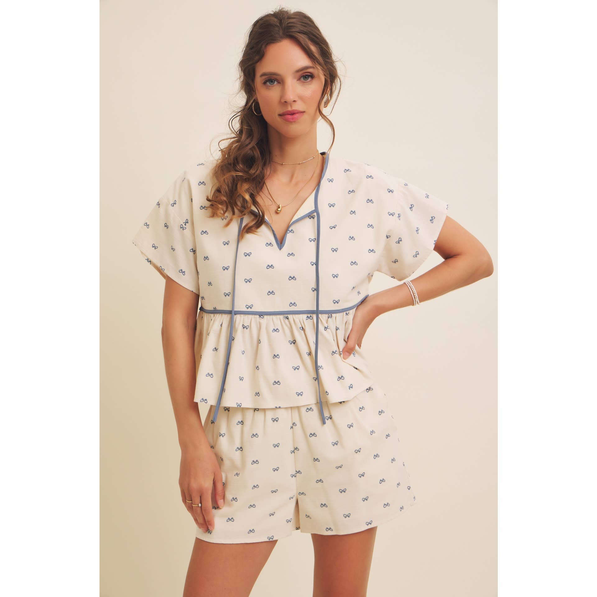 in february - Wholesale Blouse - Women's - SUNNY DAYS BOW PRINT BABYDOLL BLOUSE WITH CONTRAST BINDING1