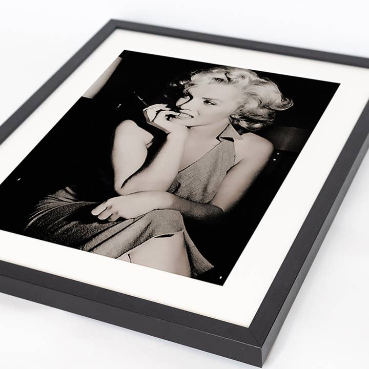 Nero Stampa artistica con immagine di Marilyn Monroe incorniciata in vendita all'ingrosso su Faire6