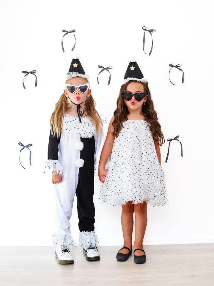 Abito da festa in bianco e nero con coriandoli per la vendita all'ingrosso da parte di Fancy Shmancy Baby