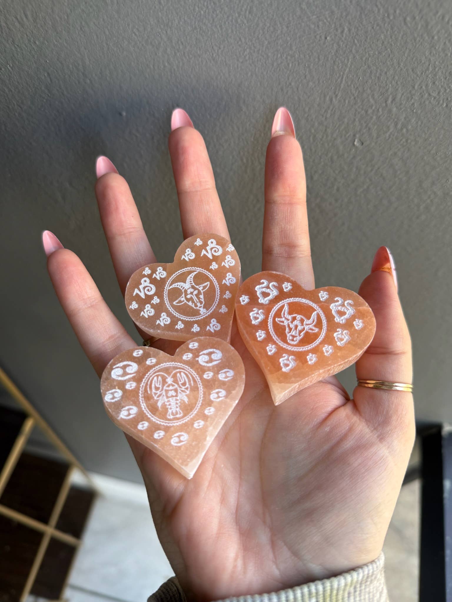 Sapphire & Sage - Wholesale Spiritual Stone/Crystal - Peach Selenite Etched Zodiac Heart Crystal Carving1