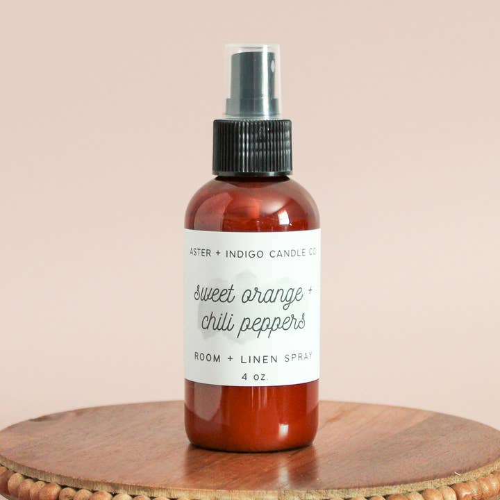 Sweet Orange + Chili Peppers | Room + Linen Spray | 4oz for wholesale by Aster + Indigo Candle Co.