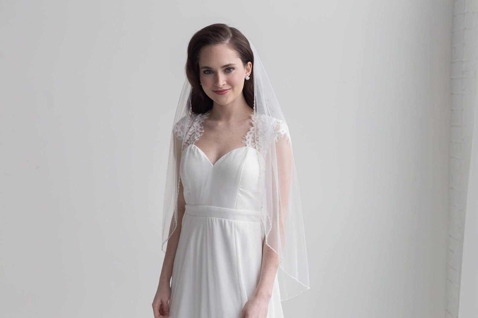 allureweddingjewelry - Wholesale Sluier - Dames - Parel en Kristallen Rand Bruidsluier1