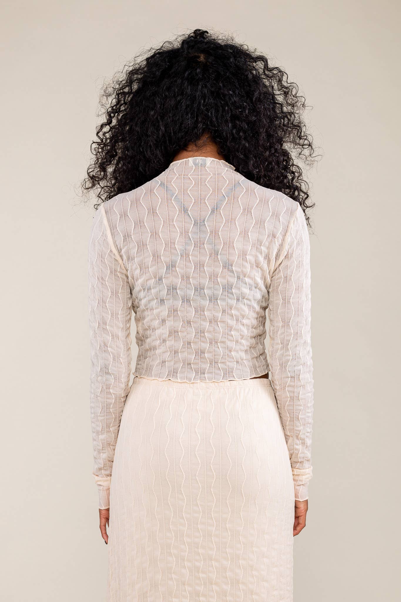 NLT - Vendita all'ingrosso Camicetta - Donna - Top in rete jacquard Abra | Manica lunga a strati ondulati7