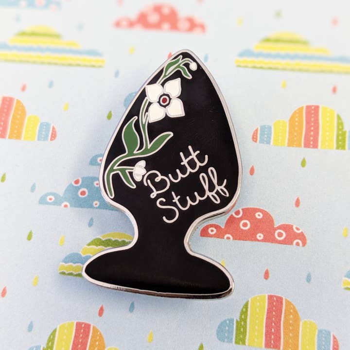 Butt Stuff - black butt plug, erotic, kinky hard enamel pin for wholesale by Cunning Linguist Co.