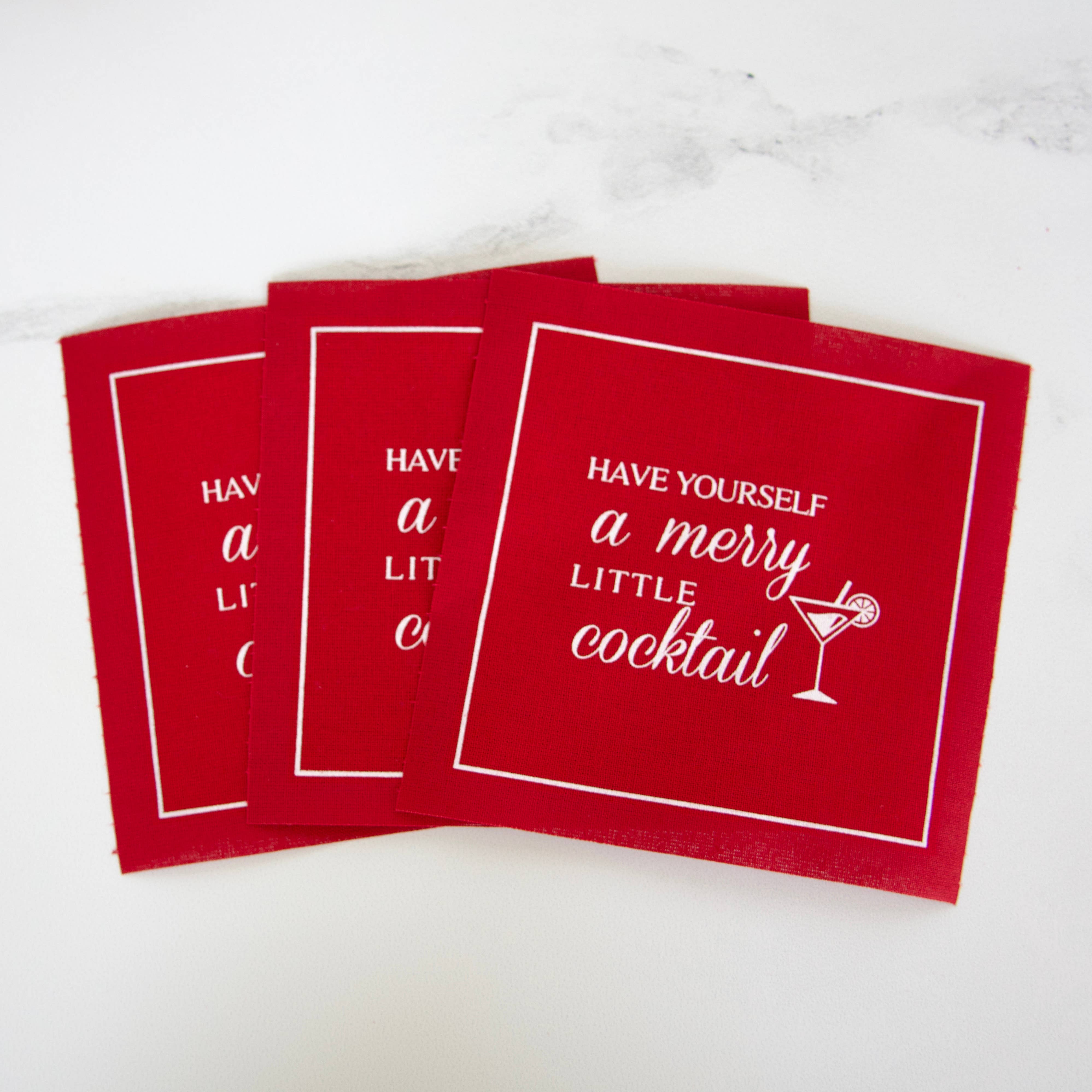 Toasting With Tara - Wholesale Disposable Napkin - Cotton Cocktail Napkin Roll: Red w/ Merry Little Cocktail1