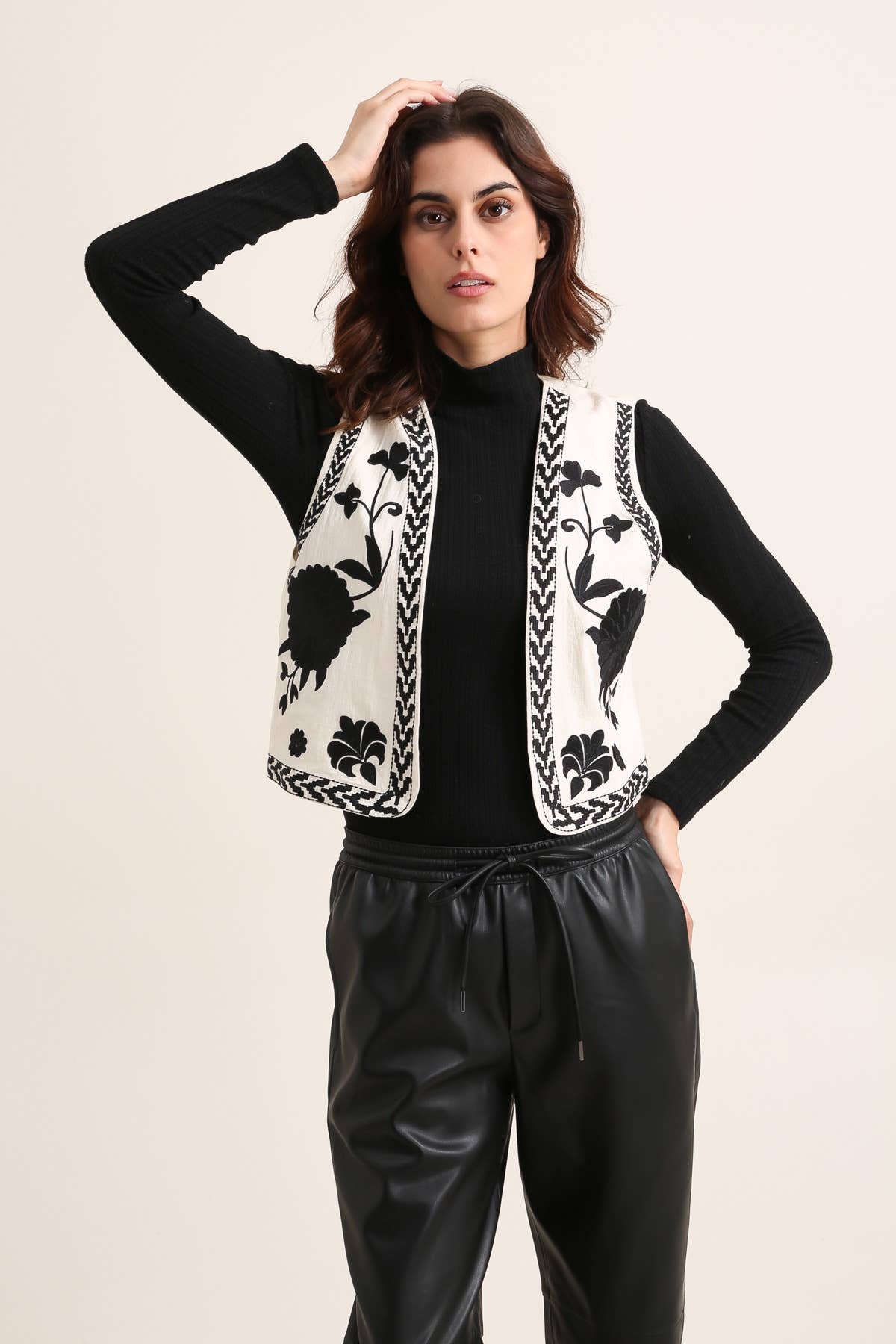 Black F9129 EMBROIDERED SLEEVELESS JACKET for wholesale on Faire