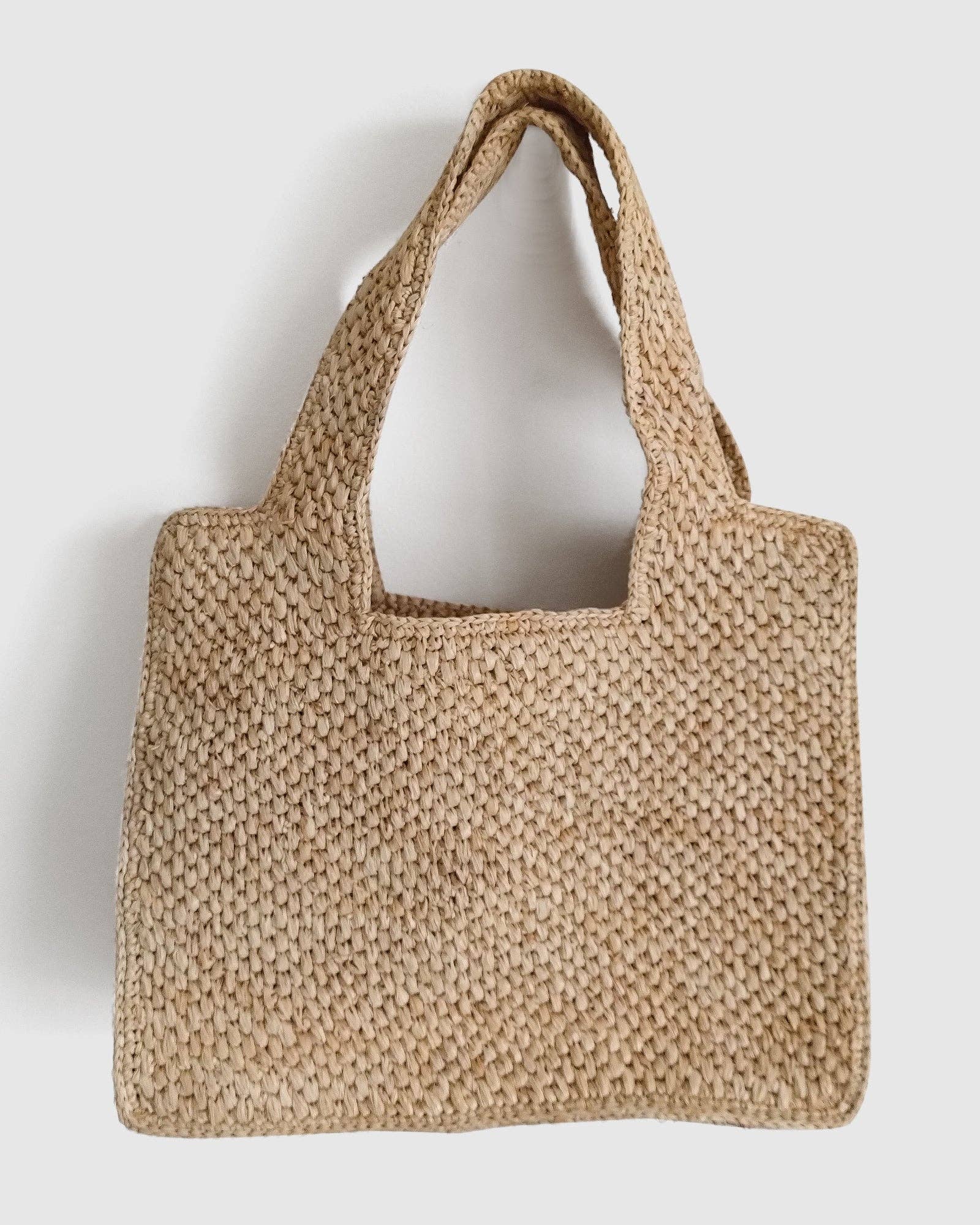 Pink Natural Miz Casa & Co Lani Raffia Basket Bag for wholesale on Faire0
