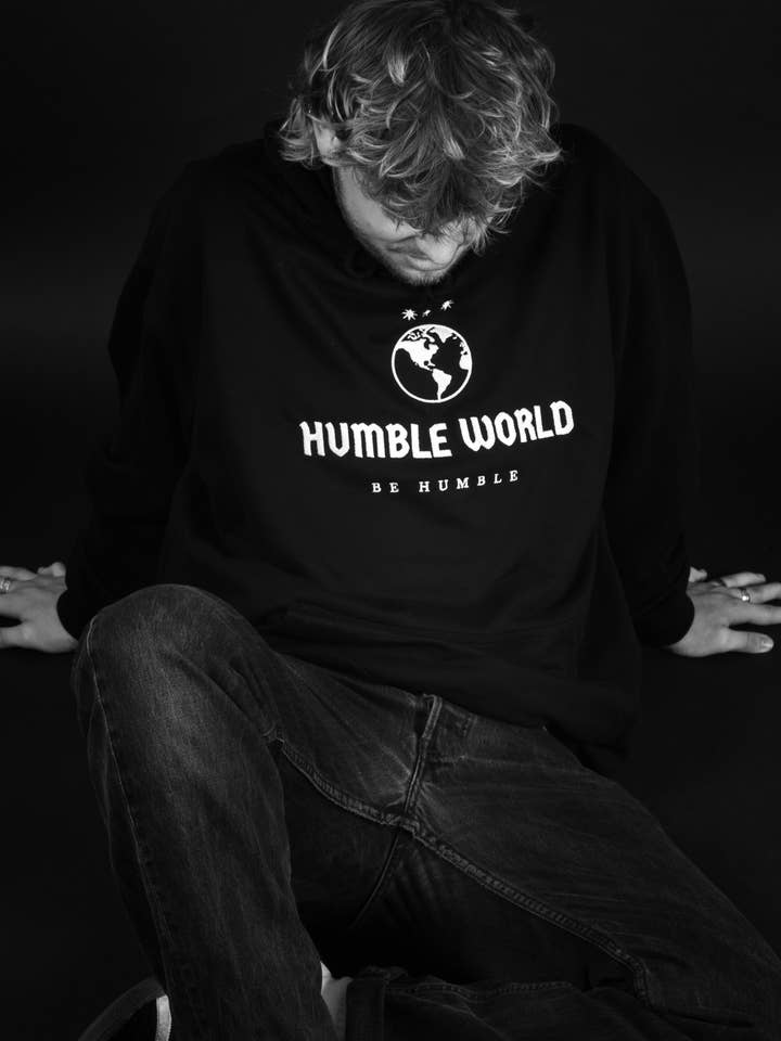 Black humbleworld logo across chest for wholesale by humbleworld ltd