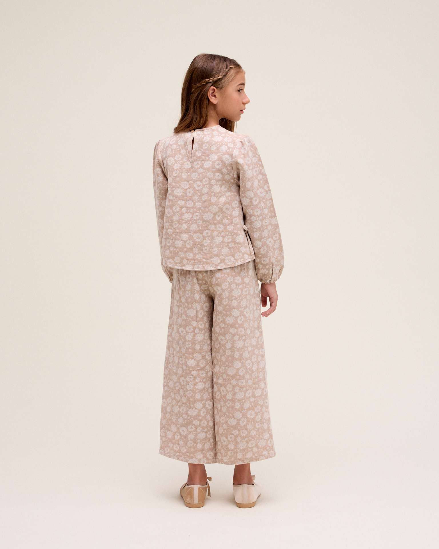 Natural Girl's long culotte pants in beige with floral print for wholesale on Faire1