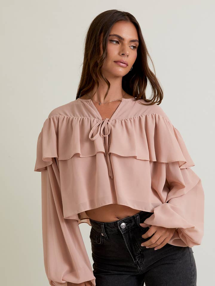 BLOUSE COURTE À VOLANTS COL ROND pour la vente par LE LIS