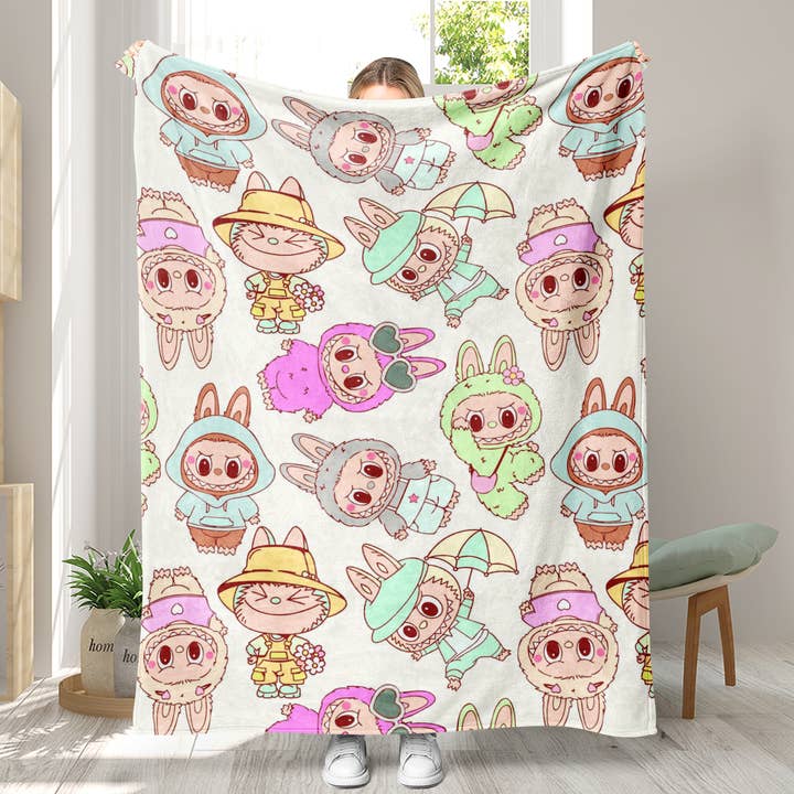 Couverture imprimée monstre mignon en flanelle douce pour la vente par Little Trendy