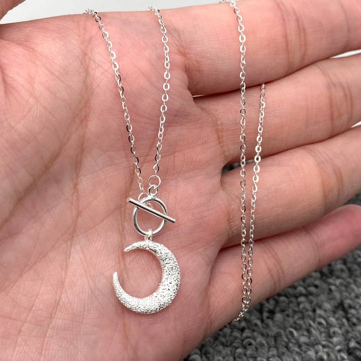 Mio Queena - Wholesale Pendant/Charm Necklace - S925 Sterling Silver Frosted Moon Charm Ot Buckle Necklace - MS