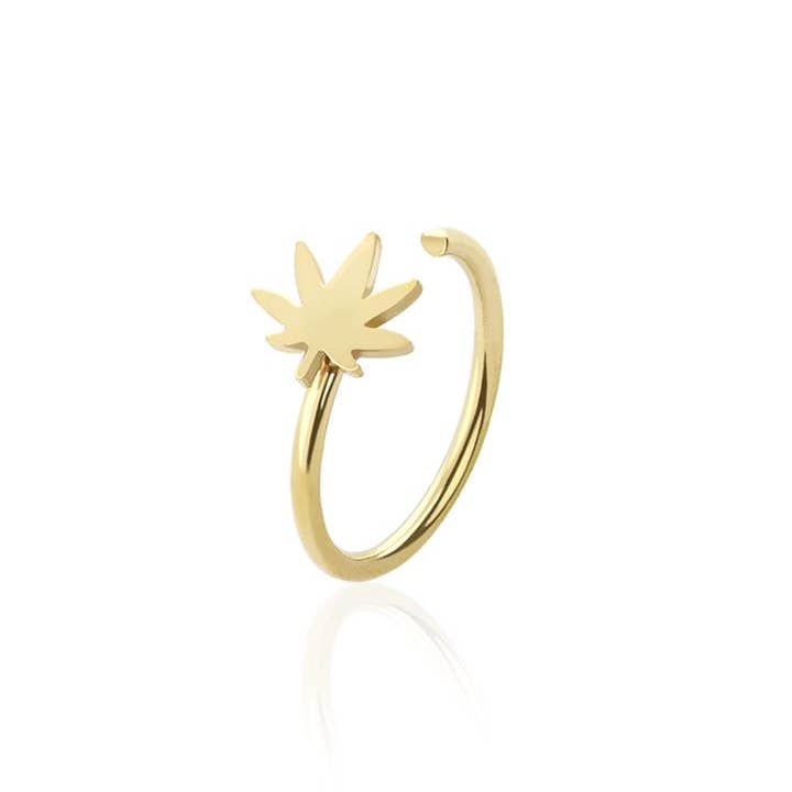 ANNEAU EN ACIER CHIRURGICAL 316L AVEC EXTRÉMITÉ DE FEUILLE DE MARIJUANA pour la vente par CRAVE BODY JEWELRY