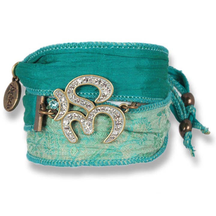 Teal Green - Silent Om Bracelet made from Indian Saris for wholesale by Anísch de la Cara