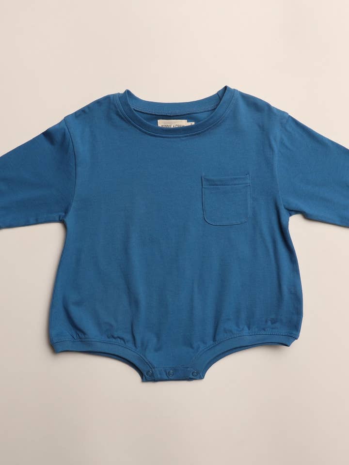 Harley Pocket Romper in Vallarta Blue for wholesale by Winnie + Crew