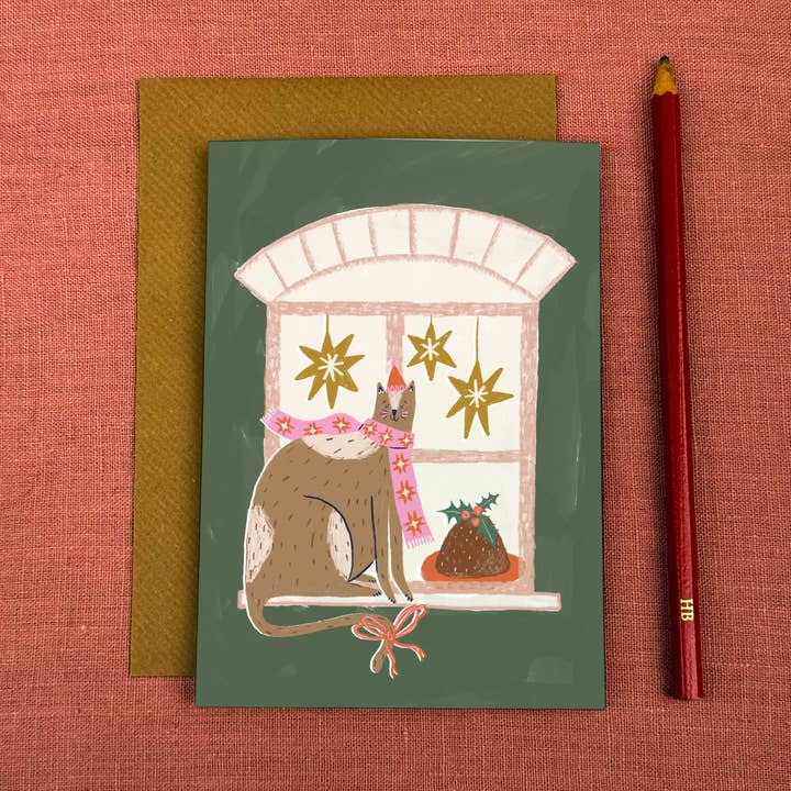 Festive Cat in Window – Christmas Card for wholesale by Knotty Knotty