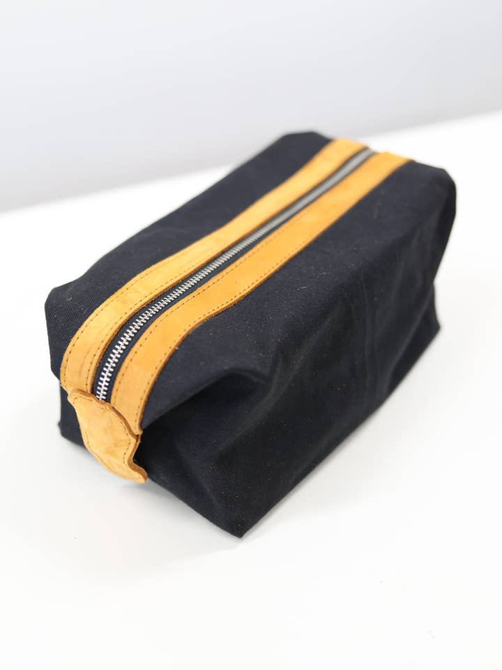 Imani Toiletry - Noir for wholesale by Jubilee Trading Co. | Ethical Trade Decor + Accessories