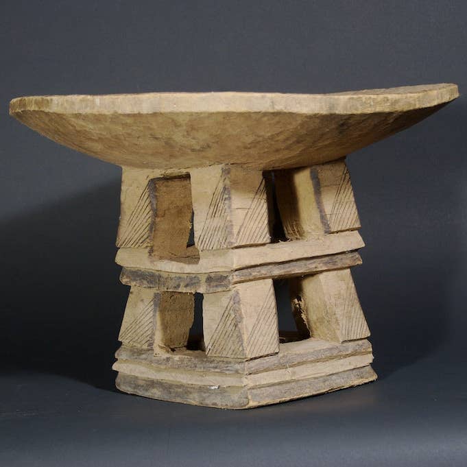 Square bottom round top stool for wholesale by The Niger Bend