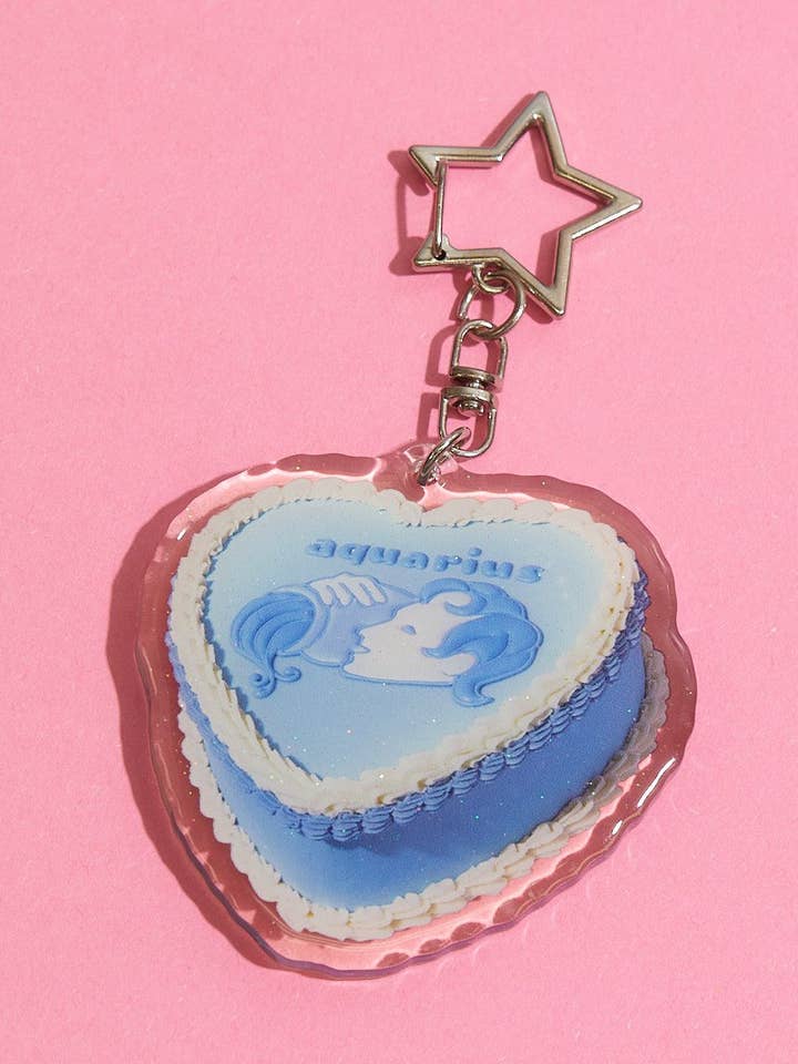Chaveiro de bolo com horóscopo Aquarius Glitter por atacado de The Gemini Bake