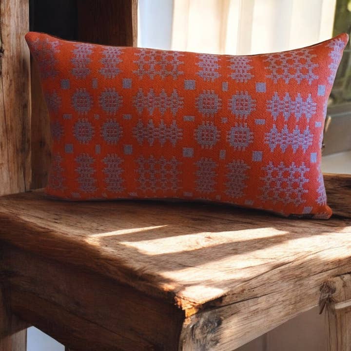 Burnt Orange Welsh tapestry Blanket design Cushions for wholesale on Faire