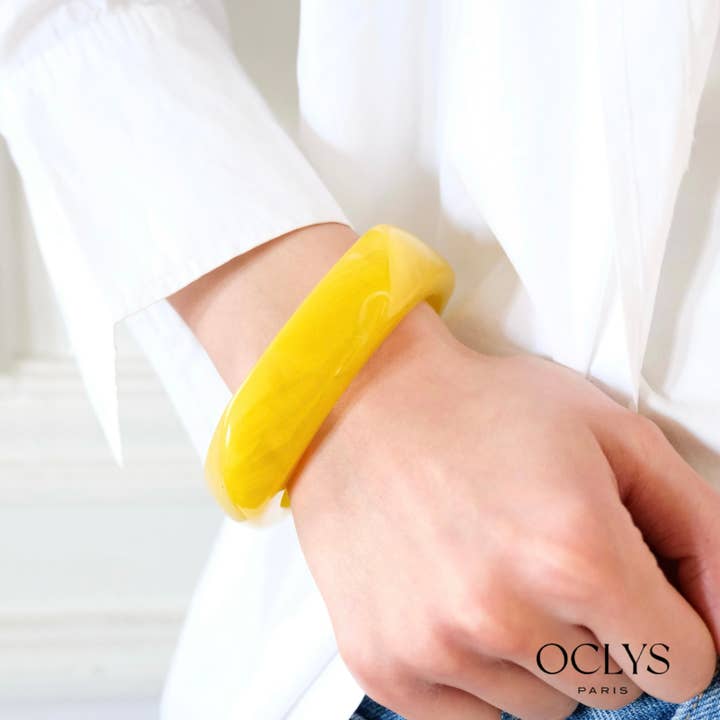 Thick colored resin rectangular bangle bracelet Bigi and other Purchase Wholesale resin bangle. Free Returns & Net 60 Terms on Faire trending on Faire.