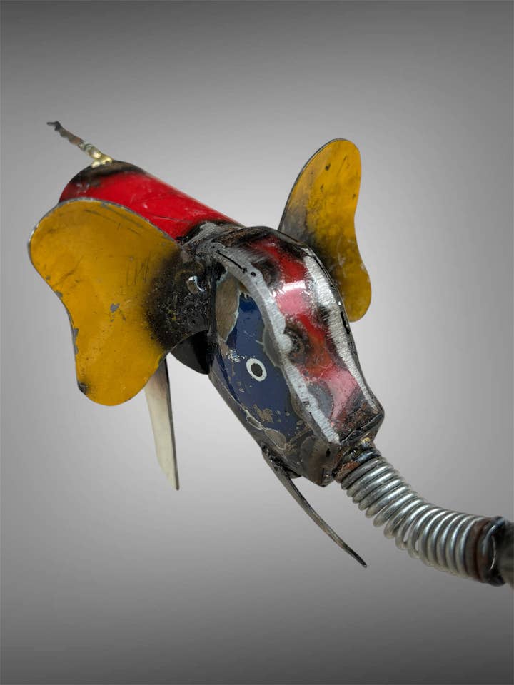 Metal recycled oil drum elephant ornament from Bali for wholesale by Batik Indah