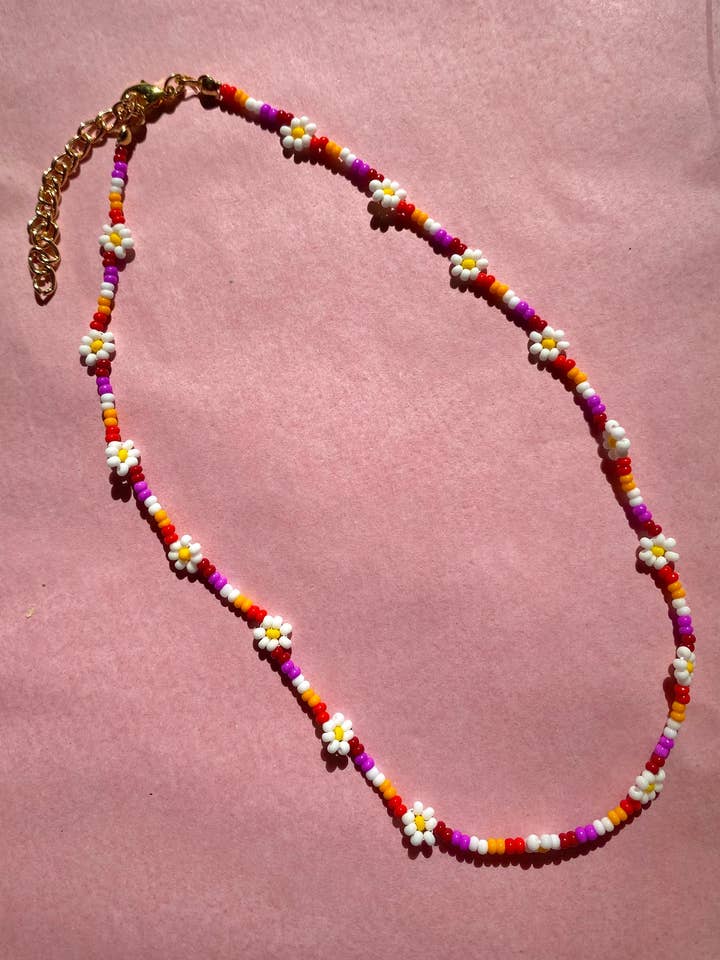 Lesbian Flag Daisy Chain Necklace for wholesale by Lil Things Shop