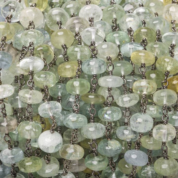 6.5-7mm Aquamarine & Beryl plain rondelle Black Gold Chain vid foten 33 stycken för wholesale av Beads of Cambay
