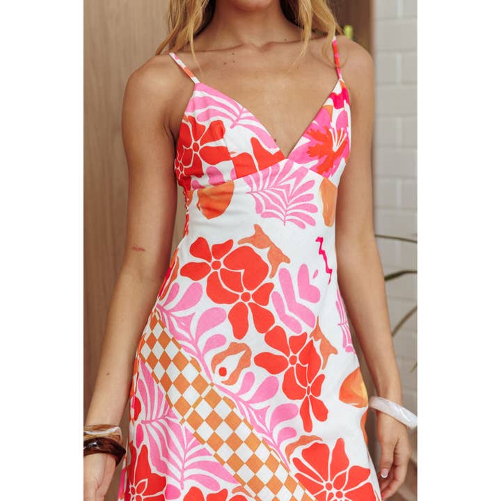 ORANGE VIBRANT FLORAL MAXI DRESS for wholesale on Faire