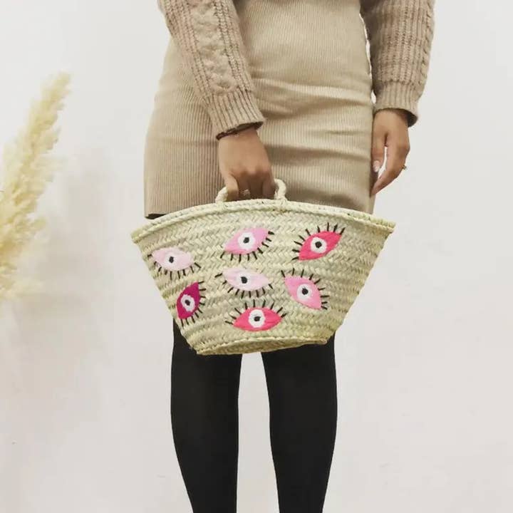 Liten stråväska med onda ögat | Marockansk handvävd strandkorg för wholesale av NomadWeave Ltd