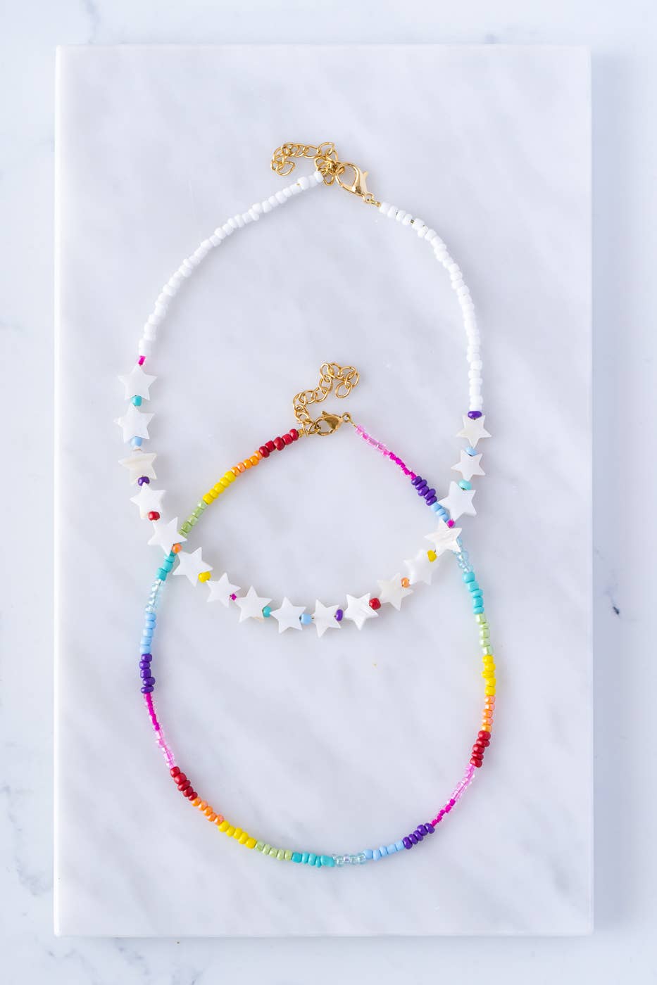 Goupi – wholesale Beaded/pearl necklace – Rainbow Choker and Star Multi Color Necklaces1