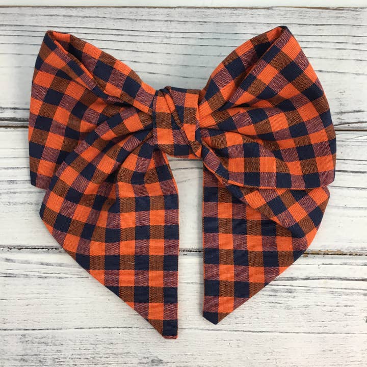Orange and navy plaid hair bow for wholesale by SongLily