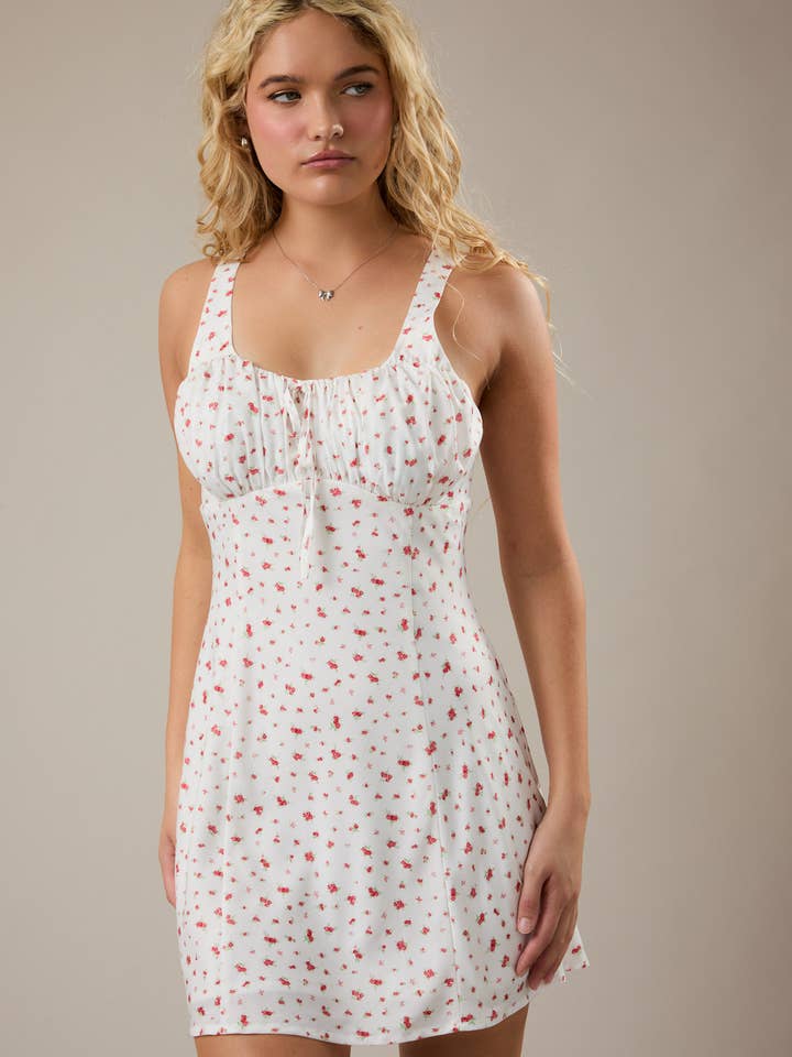 SLEEVELESS RUCHED BUST BIAS FLORAL MINI DRESS for wholesale by LE LIS